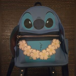 Blue Character Backpack with Floral Embellishments